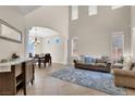 Spacious living room features high ceilings, natural light, and stylish furniture at 3925 Kettle Falls Ave, North Las Vegas, NV 89085