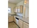 Bright kitchen featuring neutral-colored cabinets and countertops at 5650 E Sahara Ave # 2041, Las Vegas, NV 89142