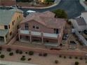 Elevated view of a home featuring a private backyard, a spacious balcony, and potential for outdoor entertaining at 827 Happy Sparrow Ave, Henderson, NV 89052