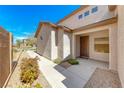 Inviting entryway with a well-maintained walkway and desert-friendly landscaping at 2528 Flodden St, Henderson, NV 89044