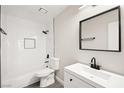 Bathroom featuring modern fixtures, white subway tile, and tub at 2793 Sandyfalls Way, Las Vegas, NV 89142