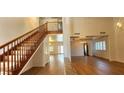 Bright living room features wood floors, fireplace, and a staircase leading to the upper level at 2916 W Oakey Blvd, Las Vegas, NV 89102
