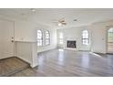 Spacious living room featuring a ceiling fan and a stunning fireplace at 4083 Nook Way # D, Las Vegas, NV 89103
