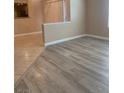 Bright living room showcasing wood-style flooring and an open layout at 8101 W Flamingo Rd # 2040, Las Vegas, NV 89147