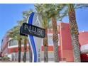 Eye-catching community signage with mature palm trees at the Allure Las Vegas residences at 200 W Sahara Ave # 3009, Las Vegas, NV 89102