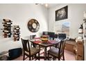 Dining room featuring a table, a wine rack, and a view at 2110 Los Feliz St # 2075, Las Vegas, NV 89156