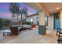 Cozy outdoor patio with comfortable seating and a welcoming atmosphere, ideal for relaxation and entertaining at 2768 Tyndrum Ave, Henderson, NV 89044