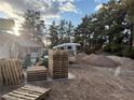 Expansive lot, partially landscaped, provides ample room for outdoor activities and storage at 3456 Happy Ln, Las Vegas, NV 89120