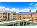 Condo building showcasing parking, views of mountains and desert landscape from a balcony at 3550 Bay Sands Dr # 3020, Laughlin, NV 89029