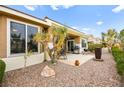 Private backyard features desert landscaping and a patio, perfect for outdoor entertaining at 482 Bonnie Brook Pl, Henderson, NV 89012