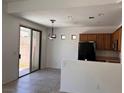 Bright kitchen featuring wood cabinets, and stainless steel appliances at 8301 Strawberry Spring St, Las Vegas, NV 89143