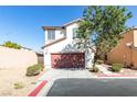 Charming two-story home with a red-brown garage door and a well-maintained front yard at 9092 Sosa Creek Ave, Las Vegas, NV 89149