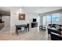 Inviting living room boasts natural light, wood floors, and comfortable seating, creating a welcoming atmosphere at 2700 Las Vegas Blvd # 3507, Las Vegas, NV 89109