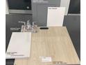 The image showcases bathroom options with sleek chrome fixtures and a quartz countertop sample at 3735 Via Allegro, Henderson, NV 89044