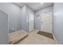 Inviting entryway with tile flooring, neutral paint and a view of the front door at 3835 Berenices Ave, North Las Vegas, NV 89084