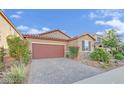 Charming single story home featuring a lush front yard and a two car garage at 5344 Bocopa St, Las Vegas, NV 89148