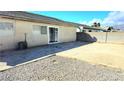 Spacious backyard with a concrete patio, perfect for outdoor entertaining and relaxation at 5406 Indigo Hills St, North Las Vegas, NV 89031