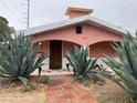Inviting front entrance with desert landscaping, and a beautiful walkway at 1201 Madison Ave, Las Vegas, NV 89106