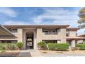 Charming condominium featuring stucco exterior and well-maintained landscaping at 2606 S Durango Dr # 287, Las Vegas, NV 89117