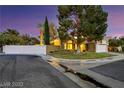 Picturesque two-story home on a corner lot with a well-maintained lawn and desert landscaping at 3024 Half Shell Way, Las Vegas, NV 89128