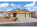 Charming single-story home featuring a two-car garage and desert landscaping at 4632 Cantina Rey St, North Las Vegas, NV 89081