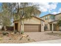 Charming two-story home featuring a two-car garage and low-maintenance desert landscaping at 6622 Palm Branch St, North Las Vegas, NV 89086