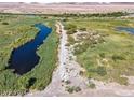 Expansive view of adjacent green space and wetlands at 6684 Black Oil Dr, Las Vegas, NV 89122