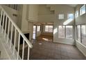 Bright and airy living room with a fireplace, lots of natural light, and tile flooring at 8166 Tone St, Las Vegas, NV 89123