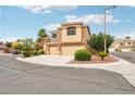 Landscaped two-story stucco home with a three-car garage on a cul-de-sac at 2337 Ivory Point Ct, Las Vegas, NV 89134