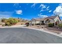 Desirable single-story home showcasing a lovely desert landscape with mountain views at 3734 John Bailey St, Las Vegas, NV 89129