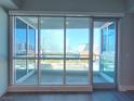 Floor to ceiling glass windows provide stunning views from the balcony at 4575 Dean Martin Dr # 1201, Las Vegas, NV 89103