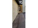Inviting home entryway with tiled walkway to front door at 503 Crony Ave, Henderson, NV 89011