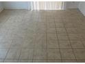 Close-up of neutral-toned tiled floors throughout the home, creating a clean and modern look at 503 Crony Ave, Henderson, NV 89011