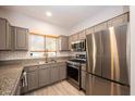 Spacious kitchen with stainless steel appliances, granite counters, and plenty of cabinet storage at 5250 S Rainbow Blvd # 2033, Las Vegas, NV 89118