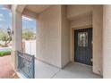 Covered porch with security door and column detail at 5609 Hannah Gordon Ct, North Las Vegas, NV 89081