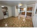 Open-concept kitchen with tile flooring and ample cabinet space at 1132 S 10Th St, Las Vegas, NV 89104