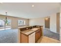 Kitchen with breakfast bar, granite countertops, and stainless steel appliances at 2088 Sawtooth Mountain Dr, Henderson, NV 89044