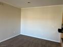 A carpeted room with neutral paint and trim, ready for personalization and decor at 2900 Sunridge Heights Pkwy # 327, Henderson, NV 89052
