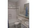 Bathroom with a shower-tub combo and tiled backsplash at 3946 Voxna St, Las Vegas, NV 89119