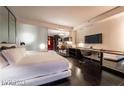 Modern suite with a comfortable king-sized bed, sleek furniture, and a well-equipped kitchenette at 4381 W Flamingo Rd # 2405, Las Vegas, NV 89103