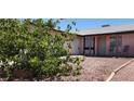 The exterior features desert landscaping and a cozy front seating area at 510 Holick Ave, Henderson, NV 89011