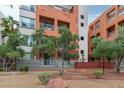 Beautiful condo community with lush landscaping and unique architecture in a desirable neighborhood at 19 E Agate Ave # 402, Las Vegas, NV 89123