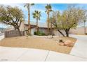 Inviting single-story home with desert landscaping, mature trees, and a private entrance at 3607 Bixbee Ct, Las Vegas, NV 89129