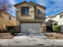 Inviting two-story home featuring a two-car garage and landscaped front yard, perfect for suburban living at 5309 Luna Bonita St, Las Vegas, NV 89113