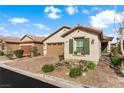 Charming single-story home with a well-manicured yard and a two-car garage at 7832 Hamilton Pool Dr, Las Vegas, NV 89113