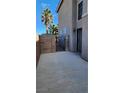 Private courtyard with block wall and gated access at 10524 Congaree St, Las Vegas, NV 89141