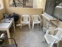 Cozy patio with tile flooring and furniture at 1112 Observation Dr # 102, Las Vegas, NV 89128