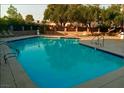 Large community pool with ample seating at 4338 Caliente St # 15, Las Vegas, NV 89119