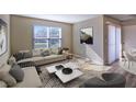 Inviting living room with plush sofas, stylish coffee tables, and an open layout at 2300 E Silverado Ranch Blvd # 1180, Las Vegas, NV 89183