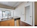 Kitchen island with stainless steel appliances and modern cabinetry at 353 E Bonneville Ave # 503, Las Vegas, NV 89101